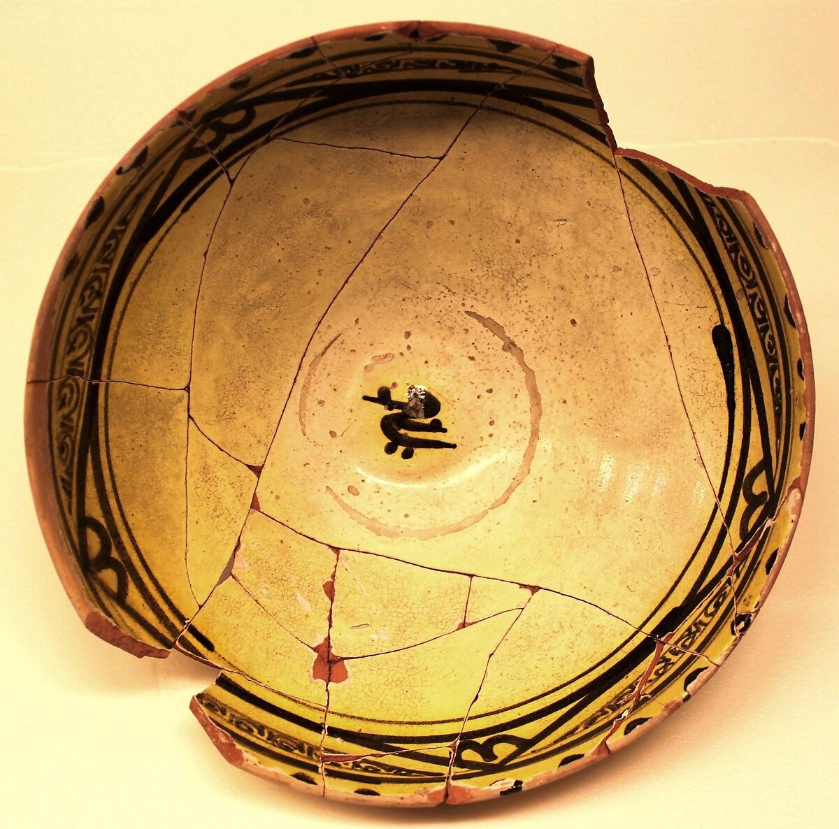 Bowl, Earthenware; white slip with black slip decoration under transparent yellowish glaze