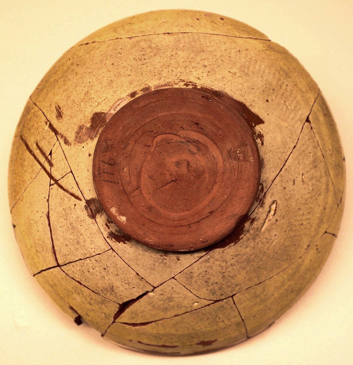 Bowl, Earthenware; white slip with black slip decoration under transparent yellowish glaze