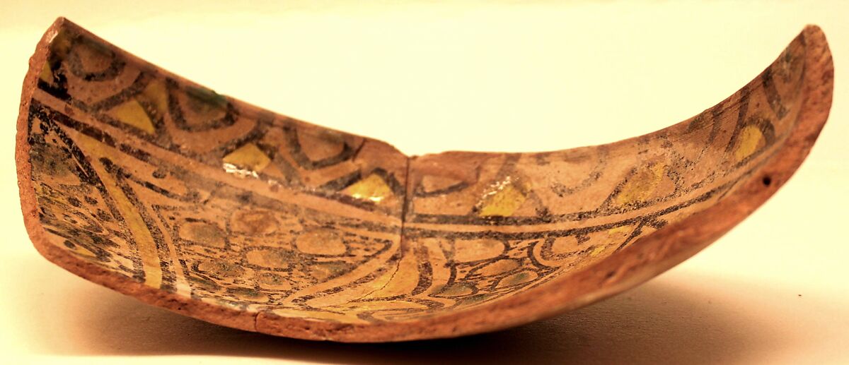 Bowl, Earthenware; pink slip and polychrome slip decoration under transparent glaze