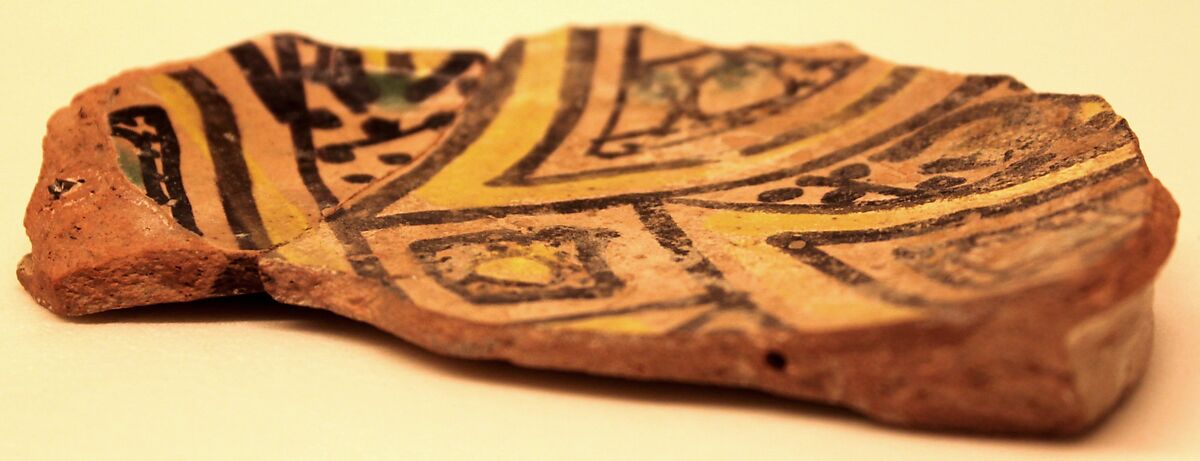 Bowl, Earthenware; pink slip and polychrome slip decoration under transparent glaze