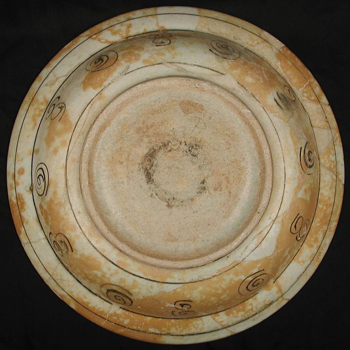 Dish, Earthenware; white slip with polychrome slip decoration under transparent bluish glaze
