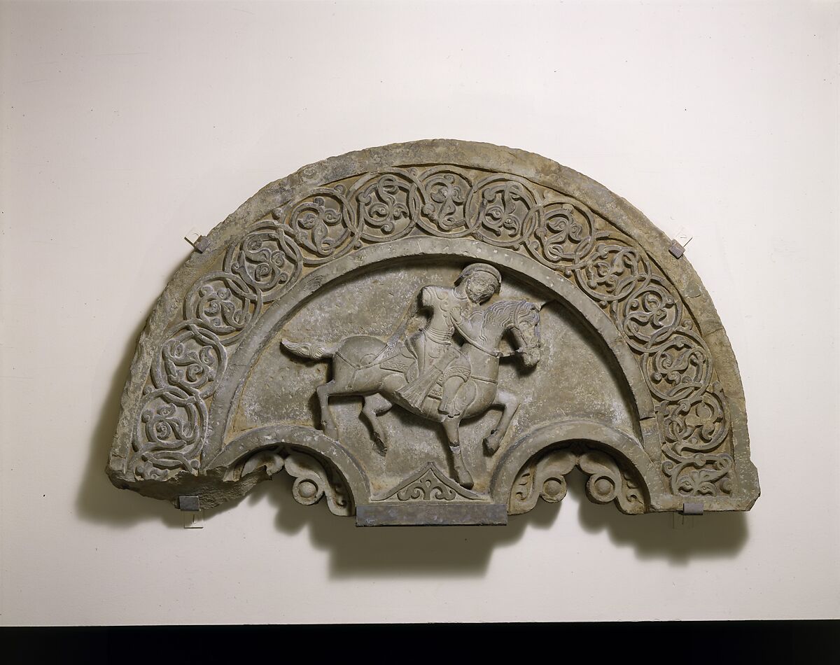 Tympanum with a Horse and Rider, Stone; carved, with traces of paint 