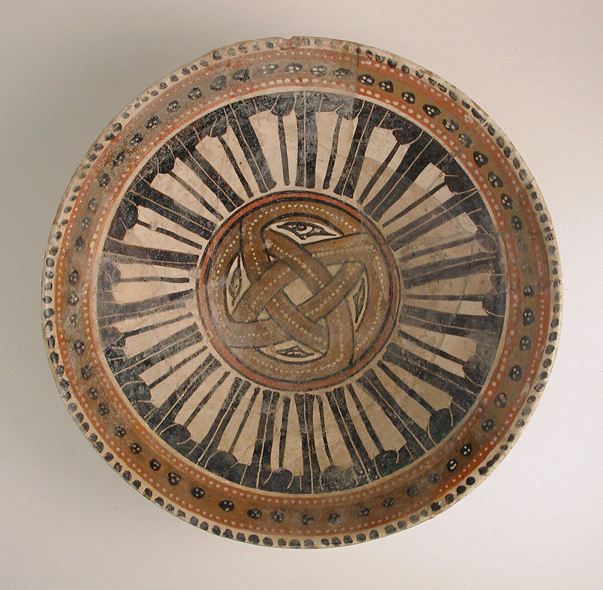 Bowl, Earthenware; white slip with polychrome slip decoration under transparent glaze 