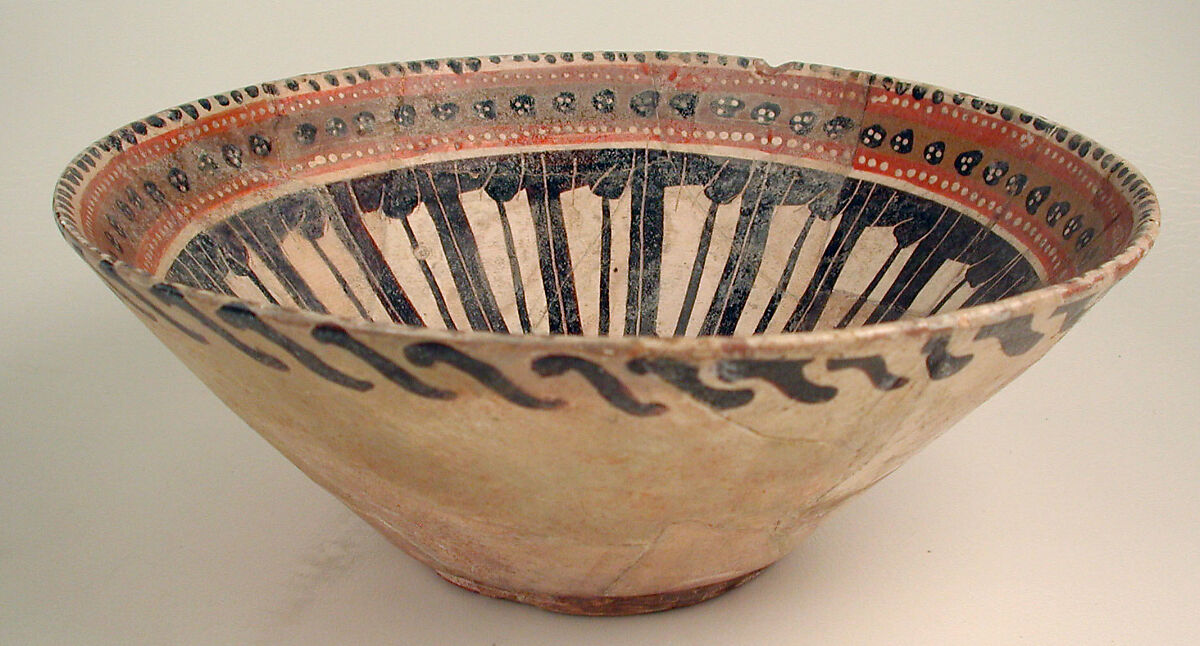 Bowl, Earthenware; white slip with polychrome slip decoration under transparent glaze