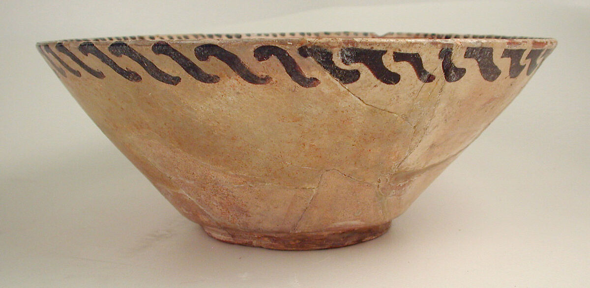 Bowl, Earthenware; white slip with polychrome slip decoration under transparent glaze