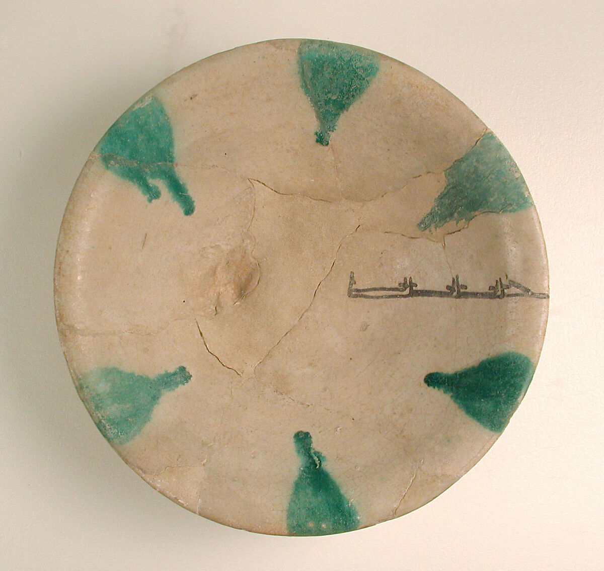 Imitation Green-Splashed Samarra Ware, Earthenware; painted in black with splashes of green on opaque white (tin) glaze