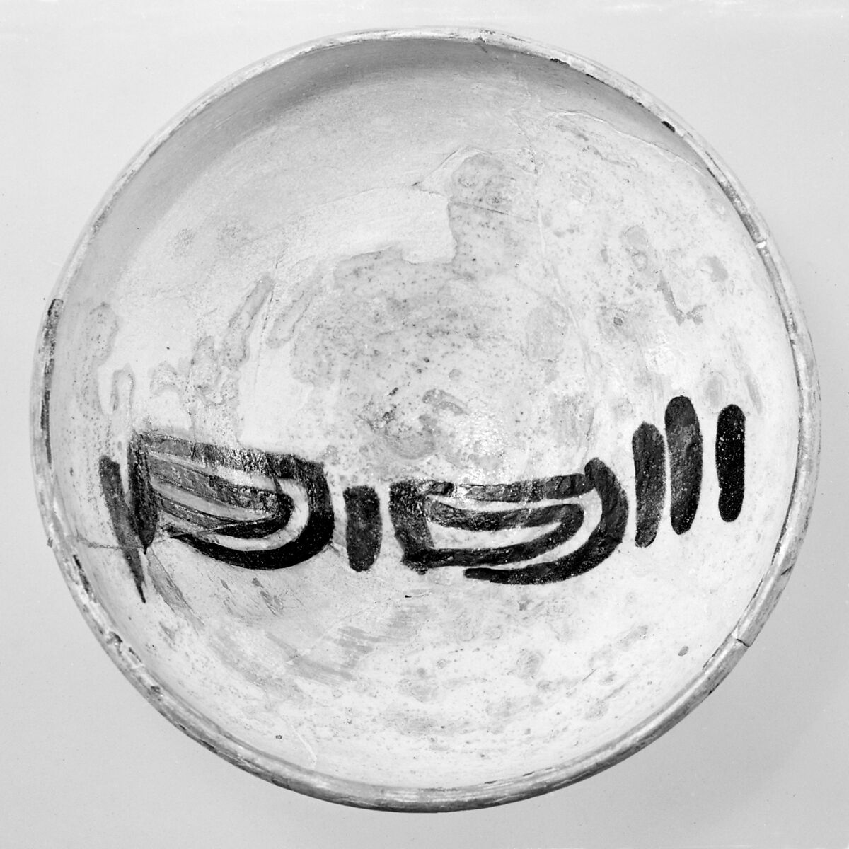 Bowl, Earthenware; white slip, monochrome slip decoration under transparent glaze 