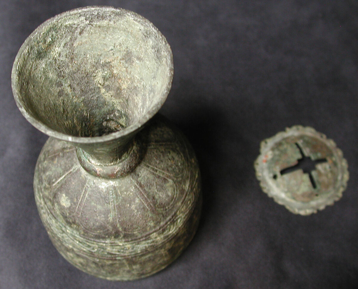 Metal Bottle with Faceted Design, Brass; cast, chased, engraved