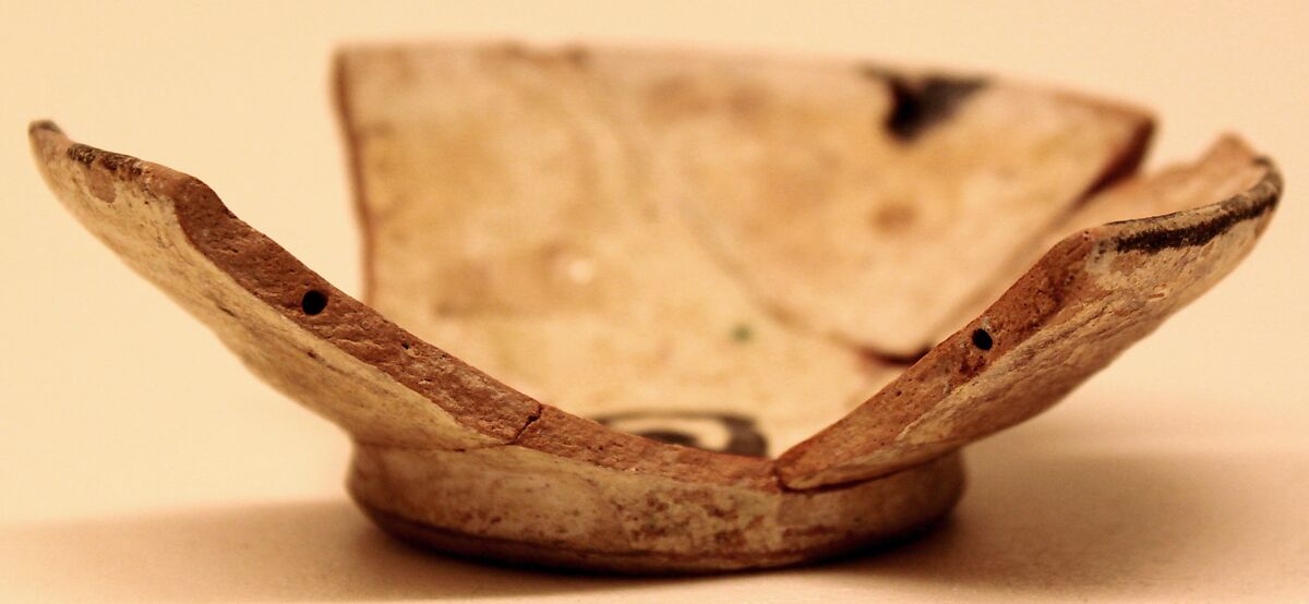 Bowl, Earthenware; white slip decorated with black decoration, glazed