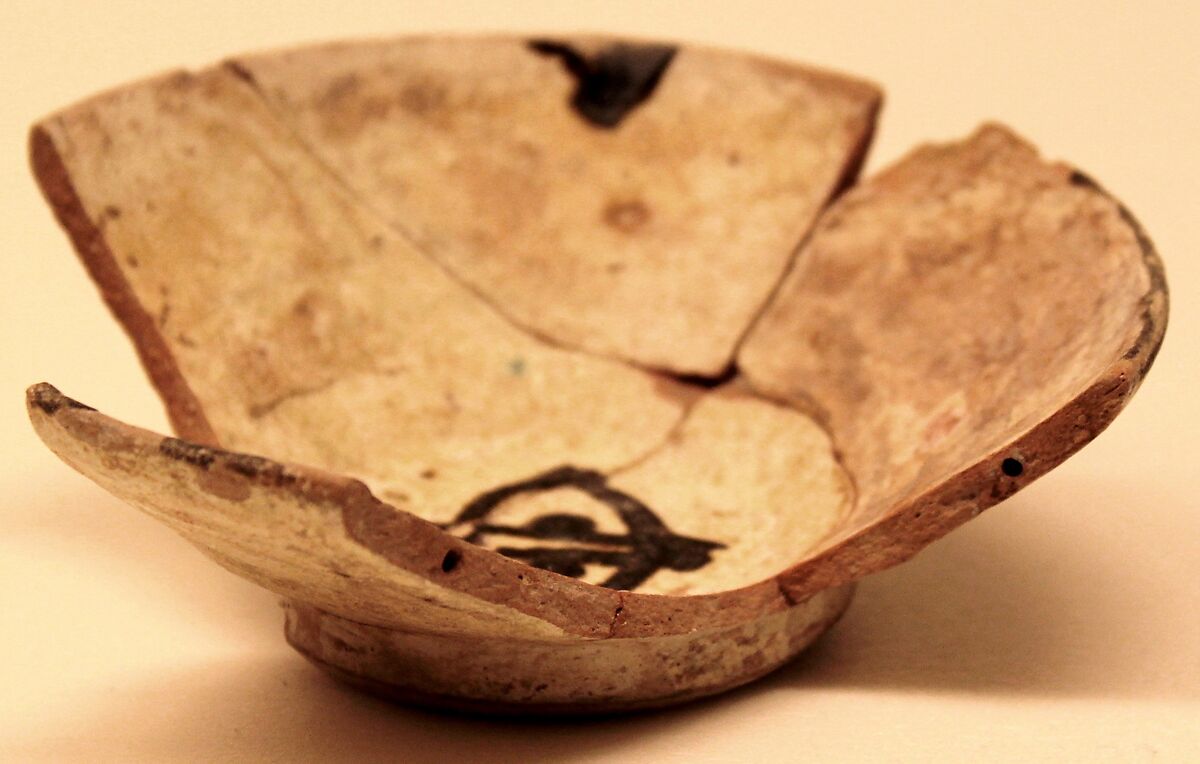 Bowl, Earthenware; white slip decorated with black decoration, glazed 