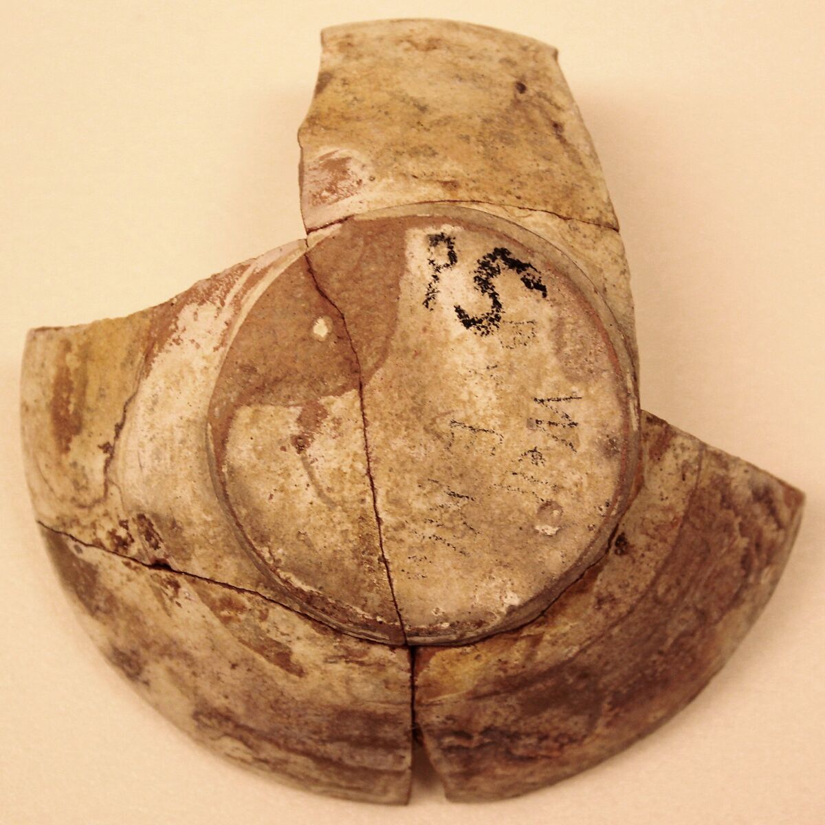Bowl, Earthenware; white slip decorated with black decoration, glazed