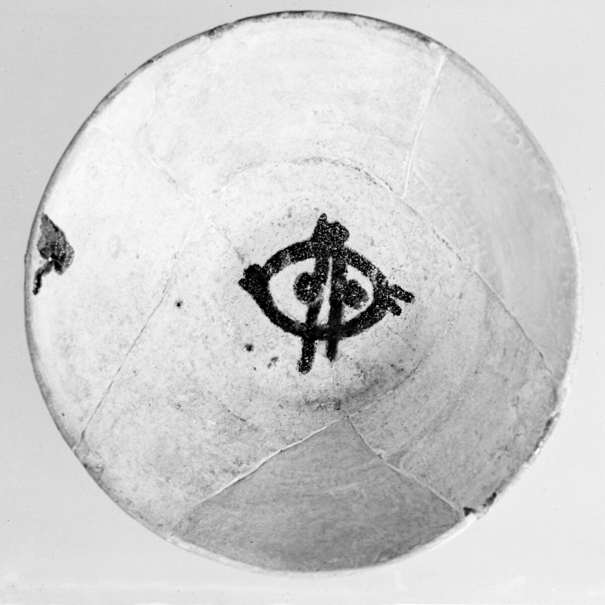 Bowl, Earthenware; white slip decorated with black decoration, glazed