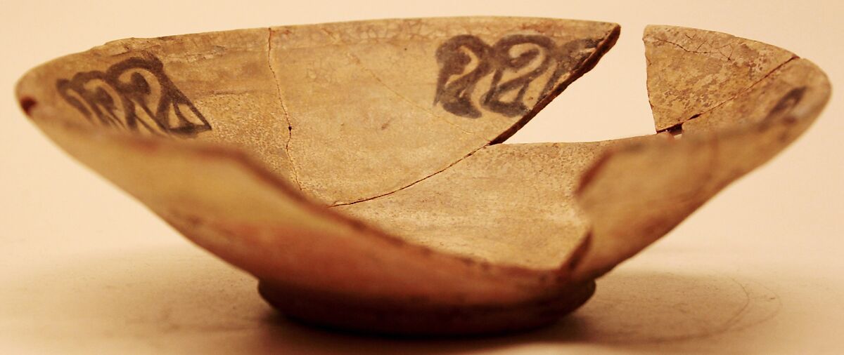 Dish, Earthenware; white slip with black slip decoration under glaze 