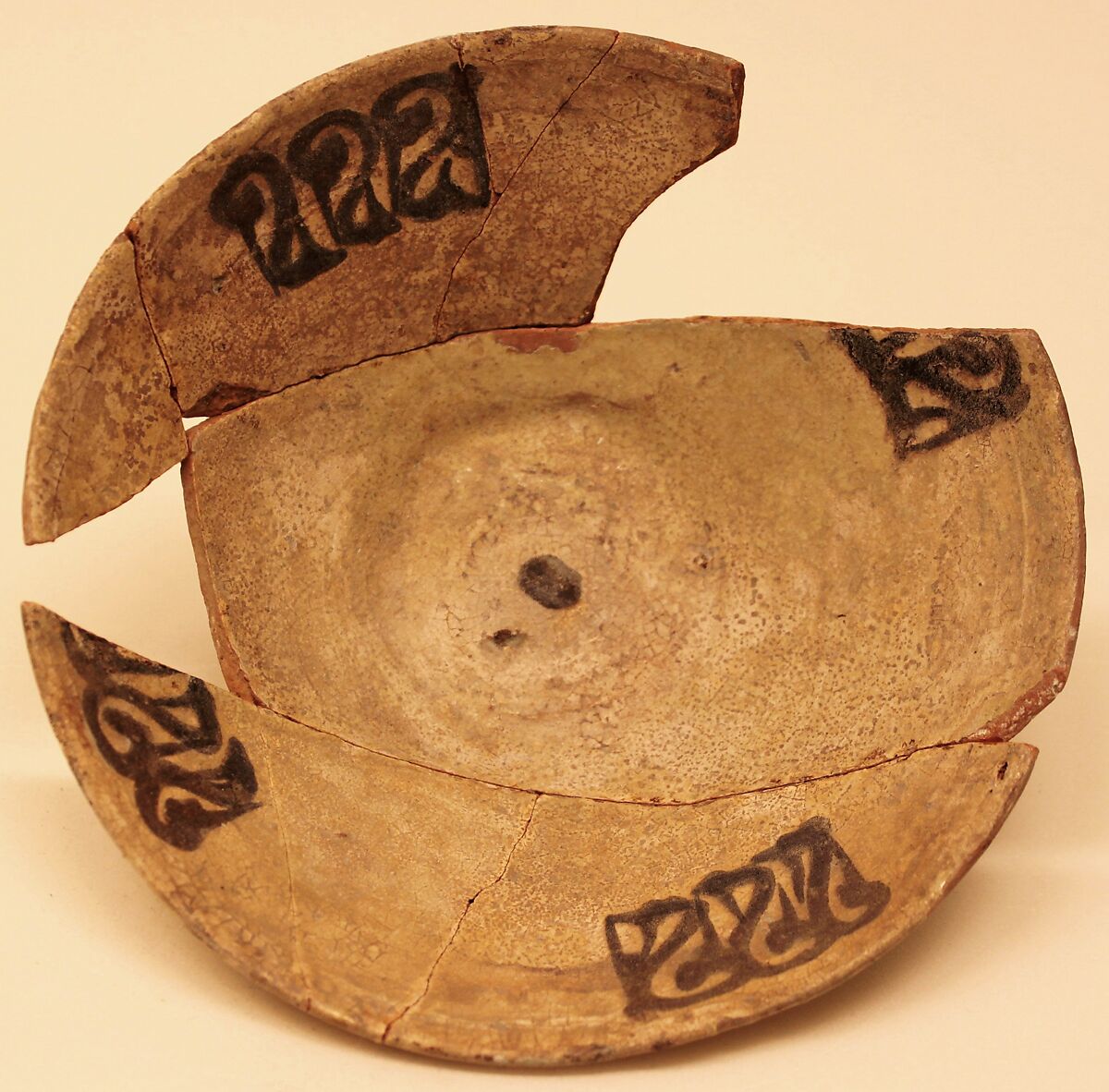 Dish, Earthenware; white slip with black slip decoration under glaze