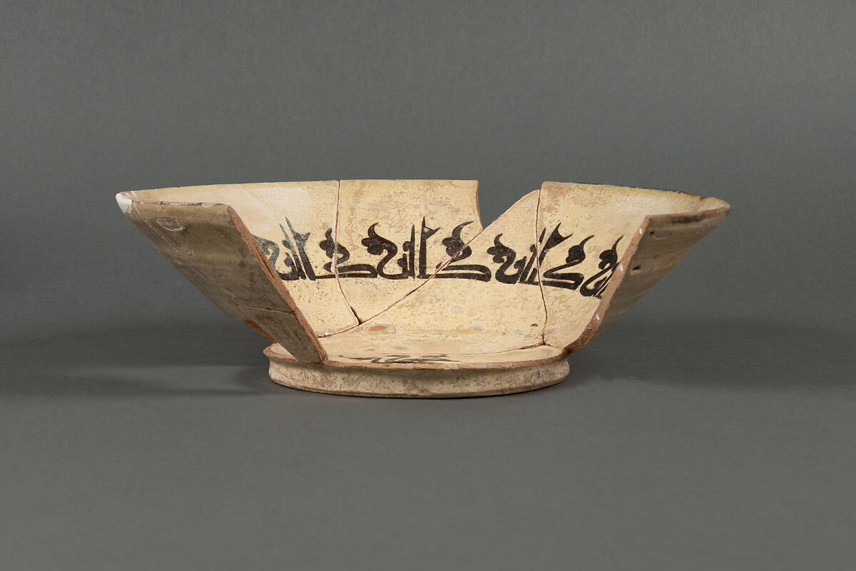 Bowl, Earthenware; white slip, decoration in black, glazed
