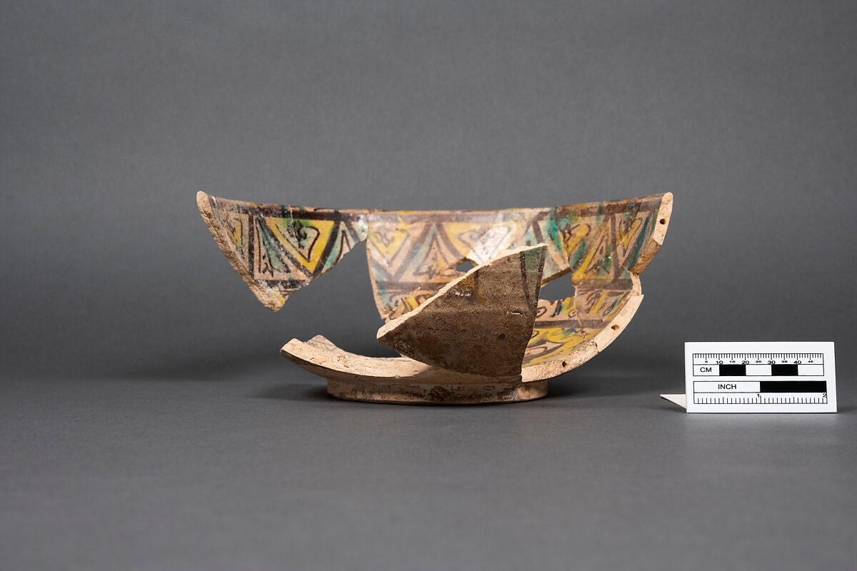 Bowl, Earthenware; painted in black slip and polychrome pigments under transparent colorless glaze (buff ware)