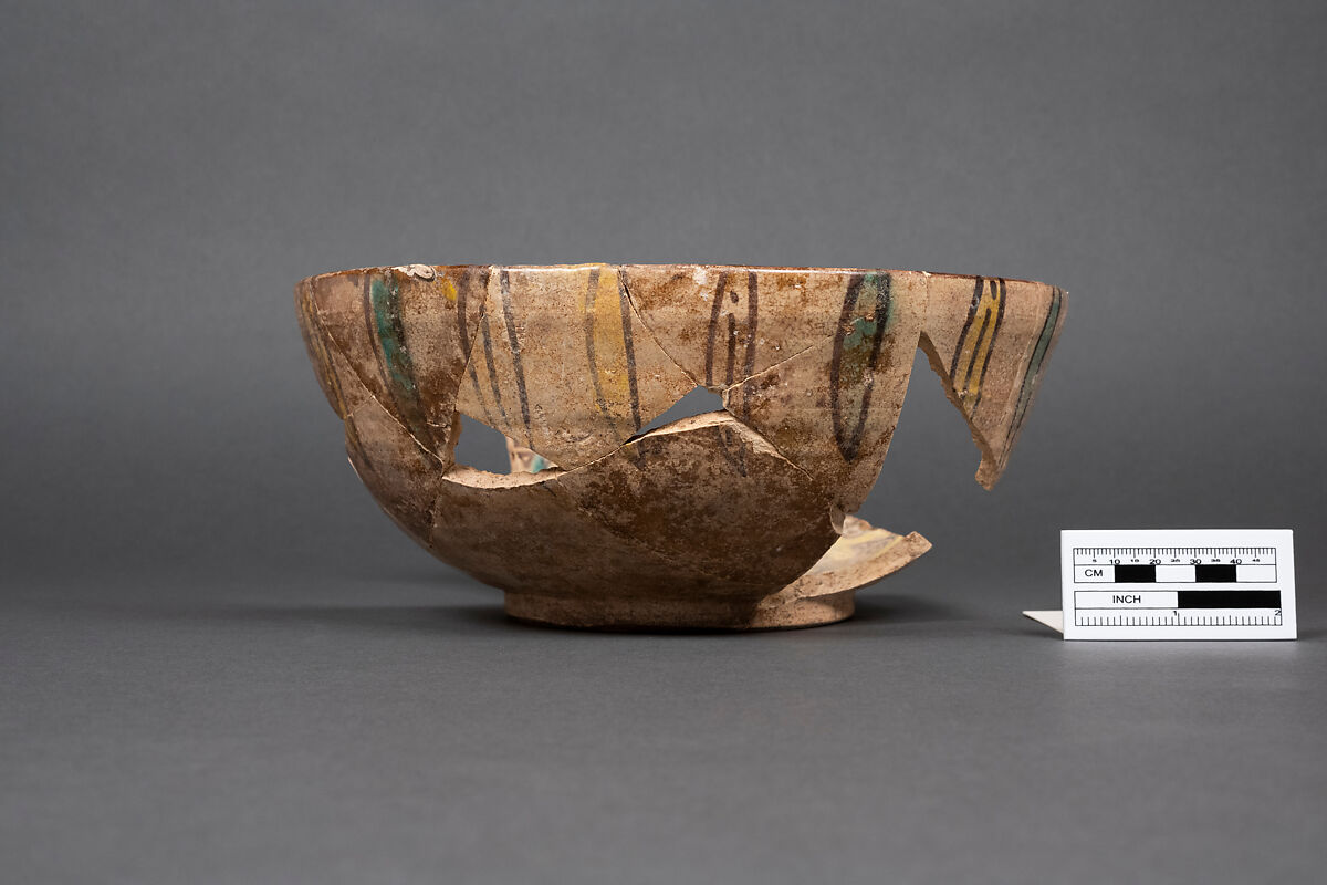 Bowl, Earthenware; painted in black slip and polychrome pigments under transparent colorless glaze (buff ware)
