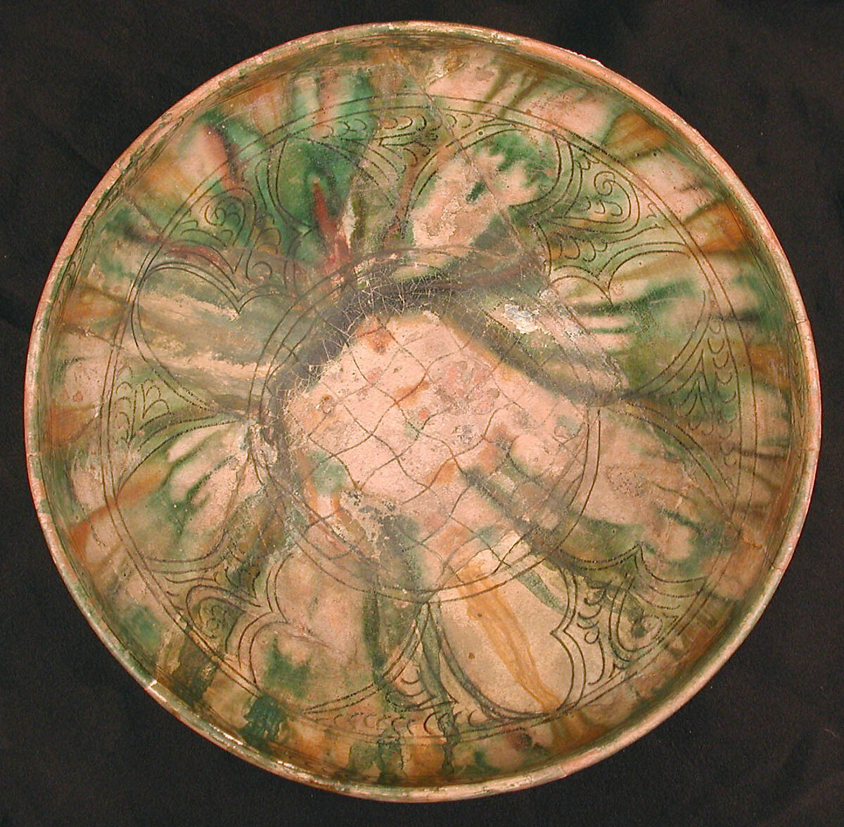 Bowl, Earthenware; white slip, incised and splashed with polychrome glazes under transparent glaze (sgraffito ware) 