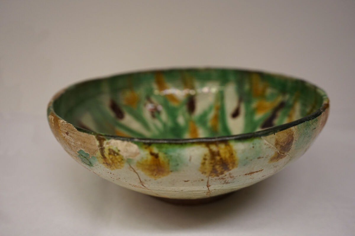 Bowl, Earthenware; white slip, incised and splashed with polychrome glazes under transparent glaze (sgraffito ware) 