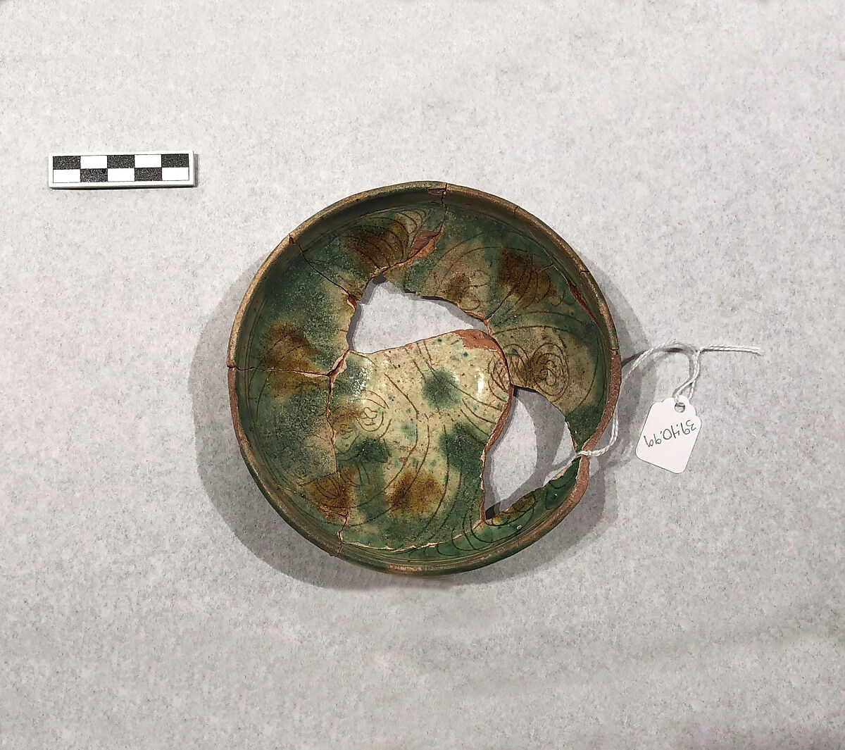 Bowl, Earthenware; white slip, incised and splashed with polychrome glazes under transparent glaze (sgraffito ware) 