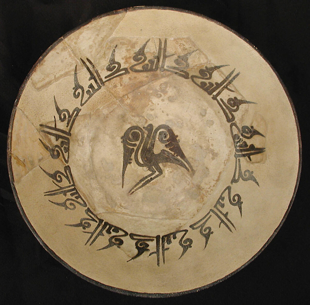 Bowl, Earthenware; white slip, decoration in black, glazed