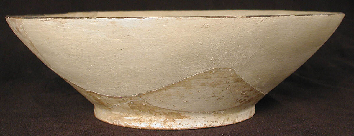 Bowl, Earthenware; white slip, decoration in black, glazed