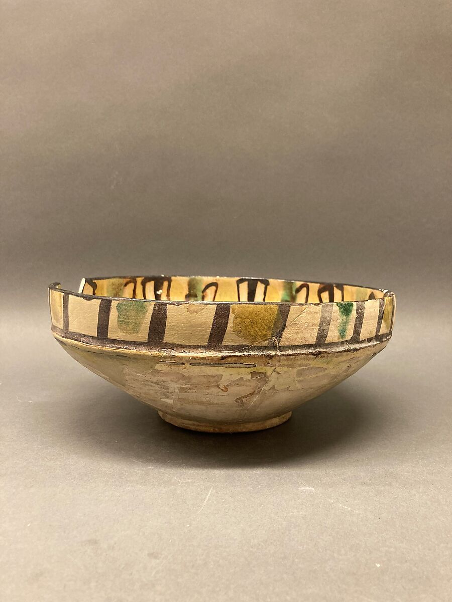 Dish, Earthenware; brown-black slip, green slip decoration under glaze