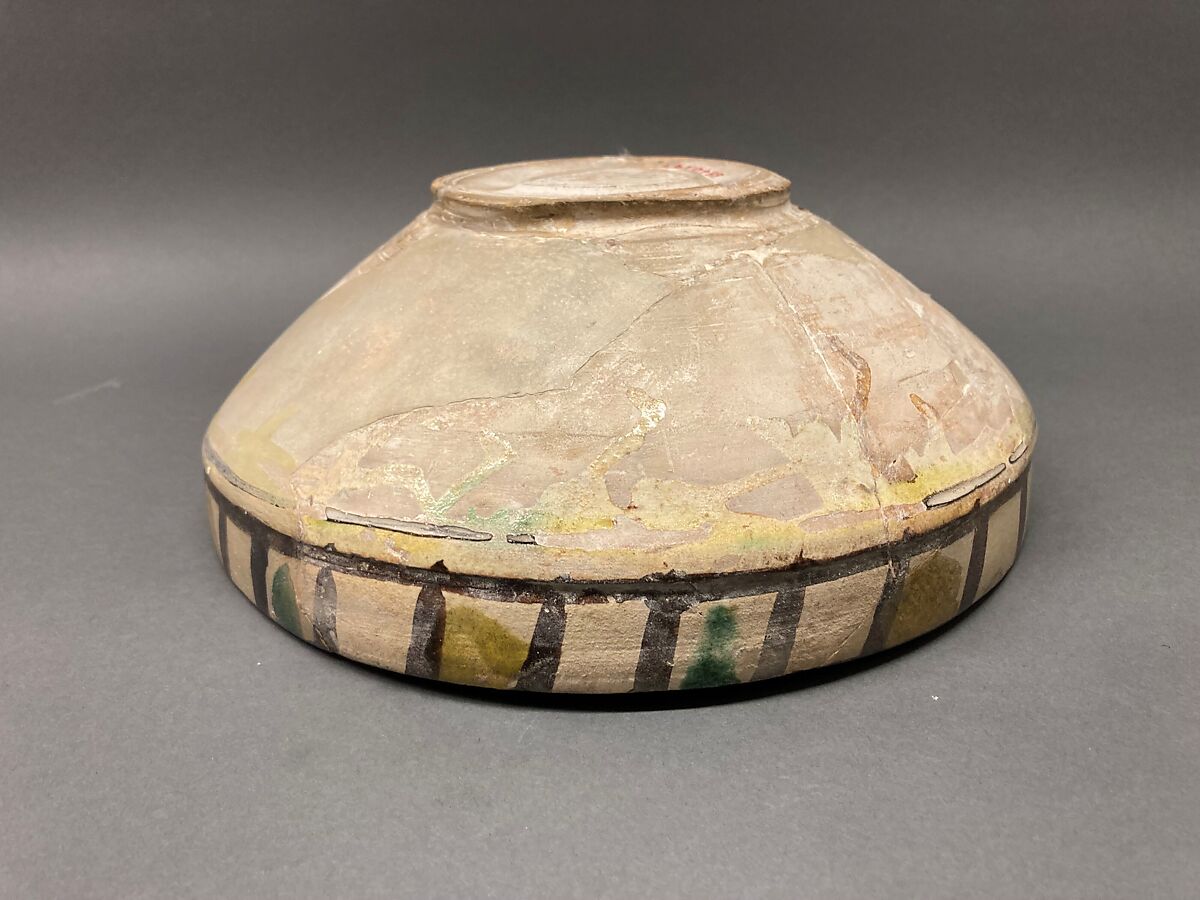 Dish, Earthenware; brown-black slip, green slip decoration under glaze