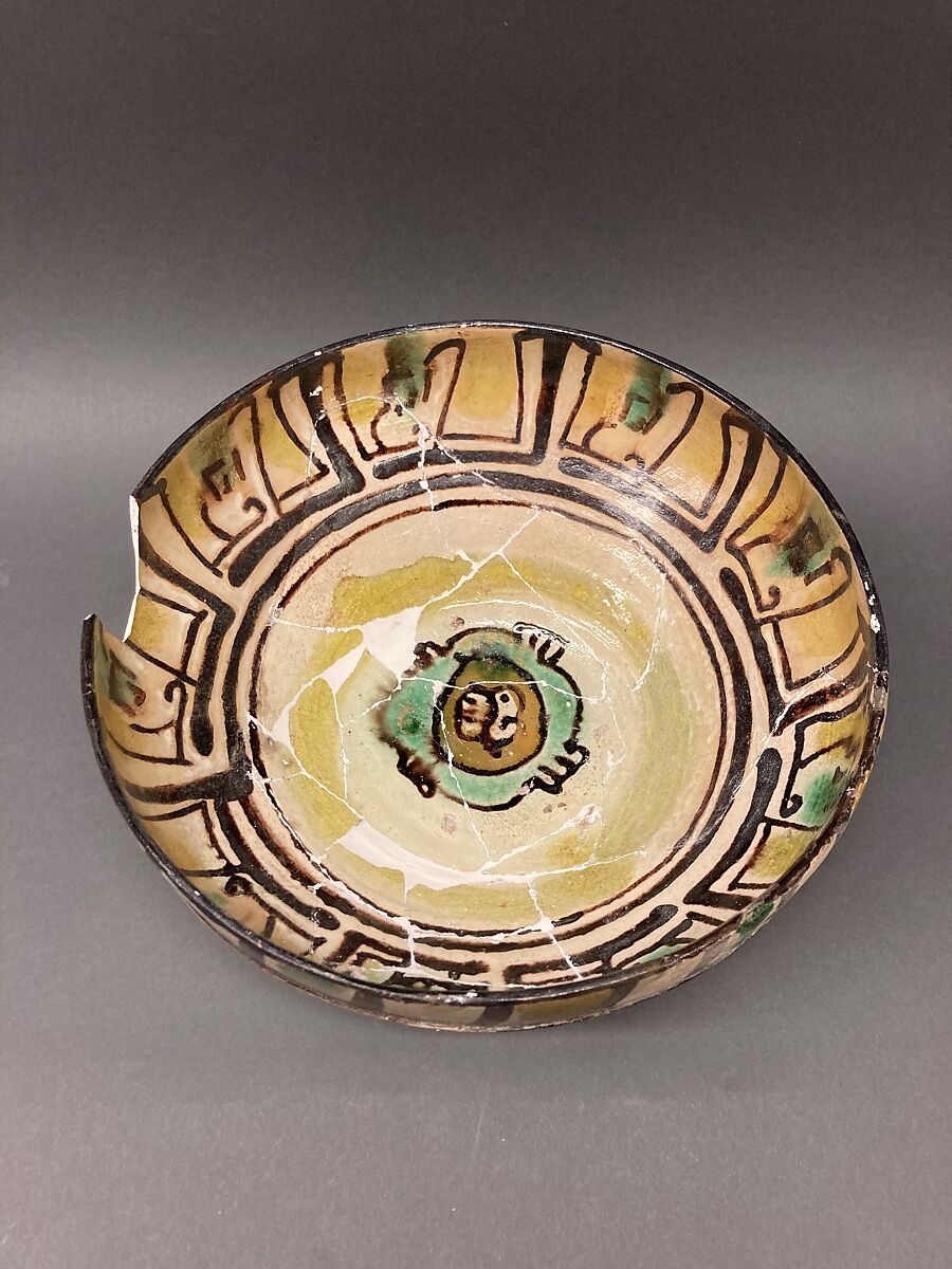Dish, Earthenware; brown-black slip, green slip decoration under glaze