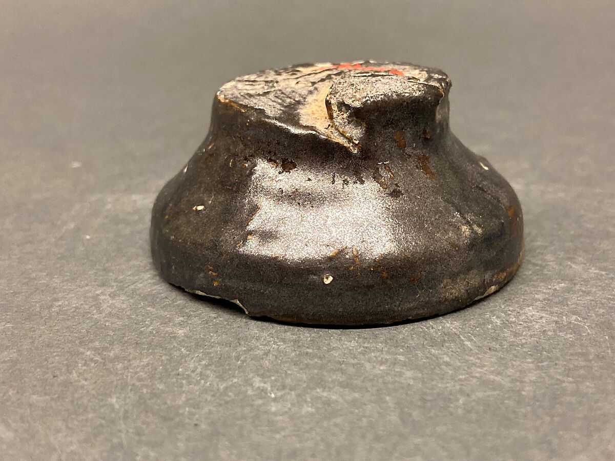 Dish, Earthenware; brown-black slip, green slip decoration under glaze