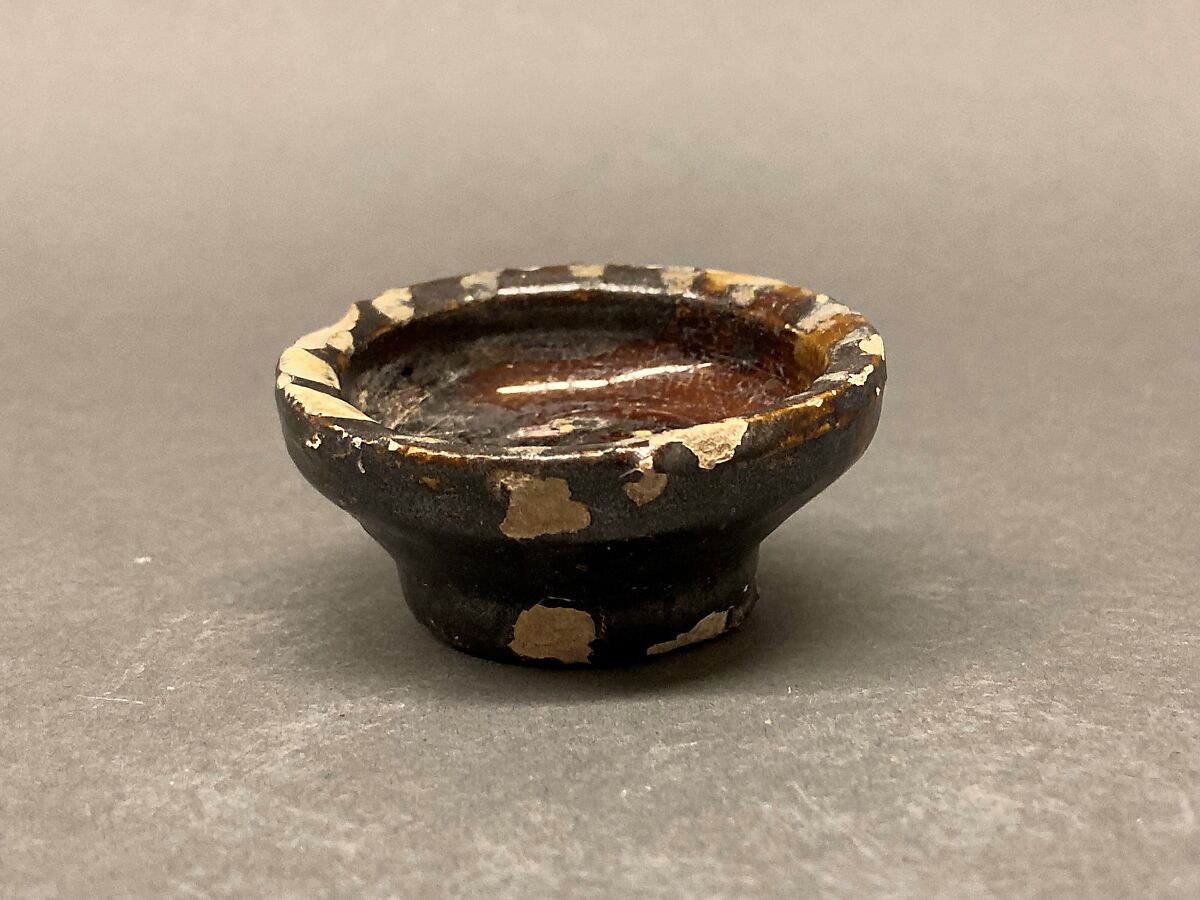 Dish, Earthenware; brown-black slip, green slip decoration under glaze