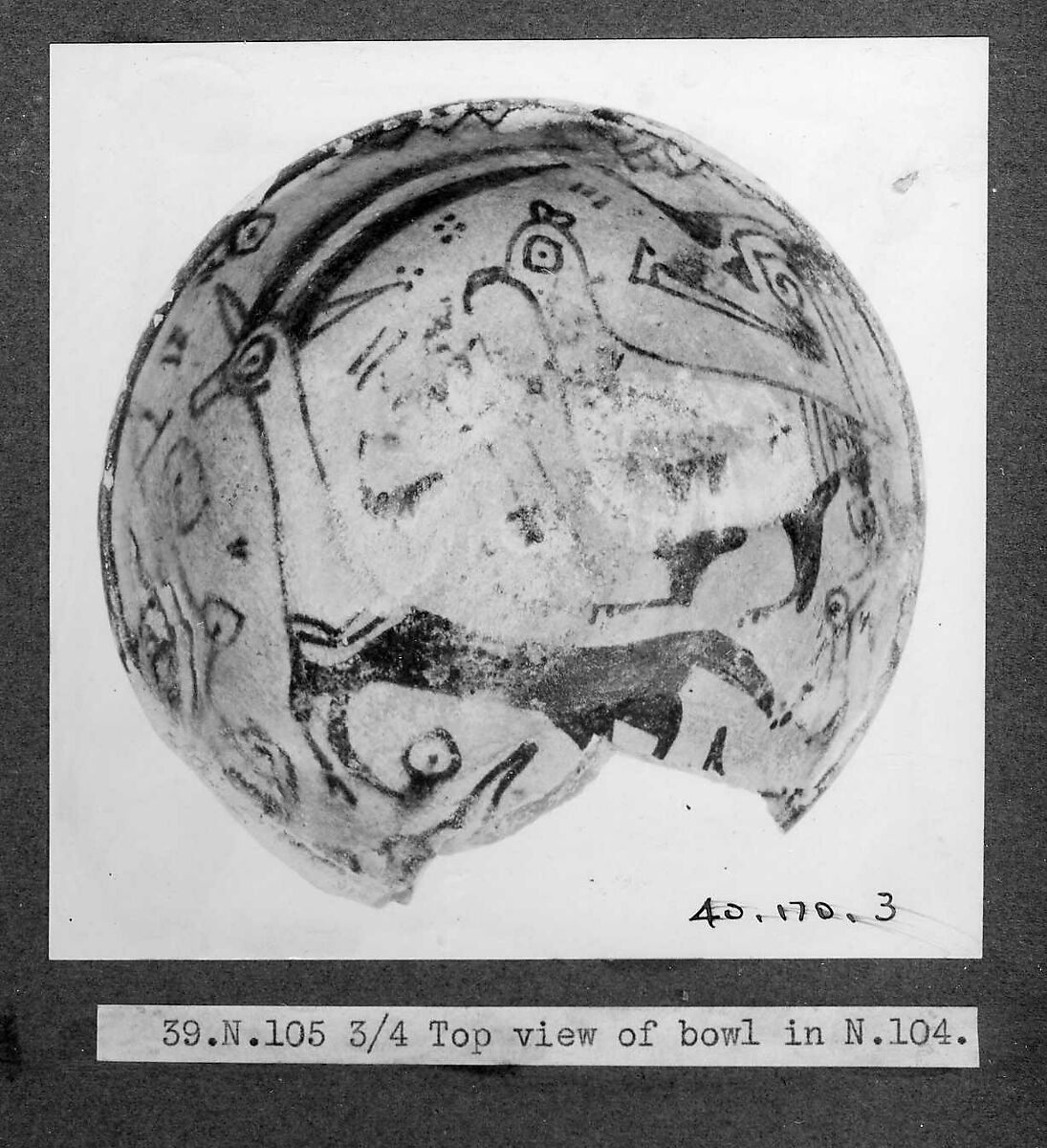 Dish, Earthenware; buff slip, decoration in black with touches of yellow and green, glazed 