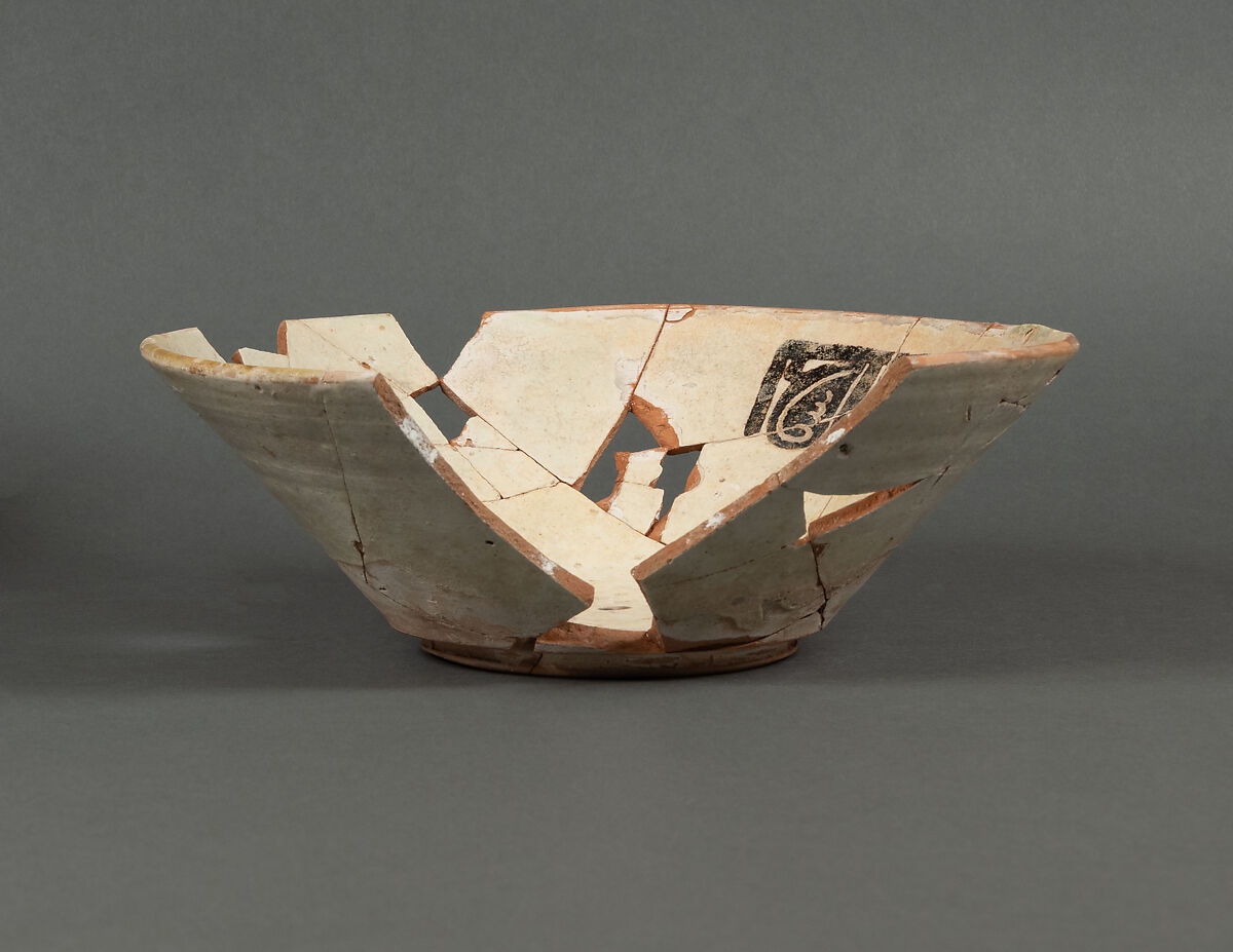 Bowl, Earthenware; white slip, decoration in brown, black and red, glazed