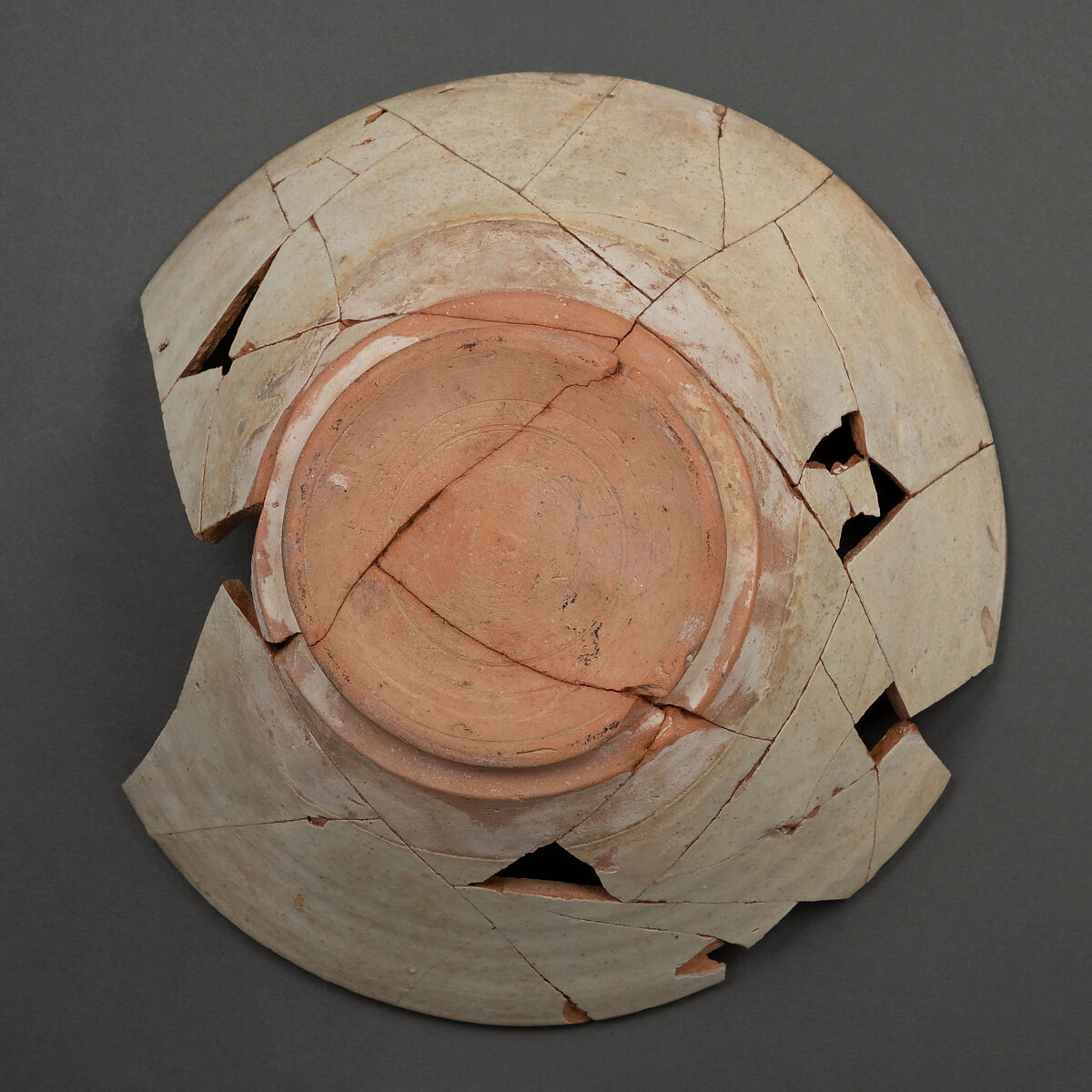 Bowl, Earthenware; white slip, decoration in brown, black and red, glazed