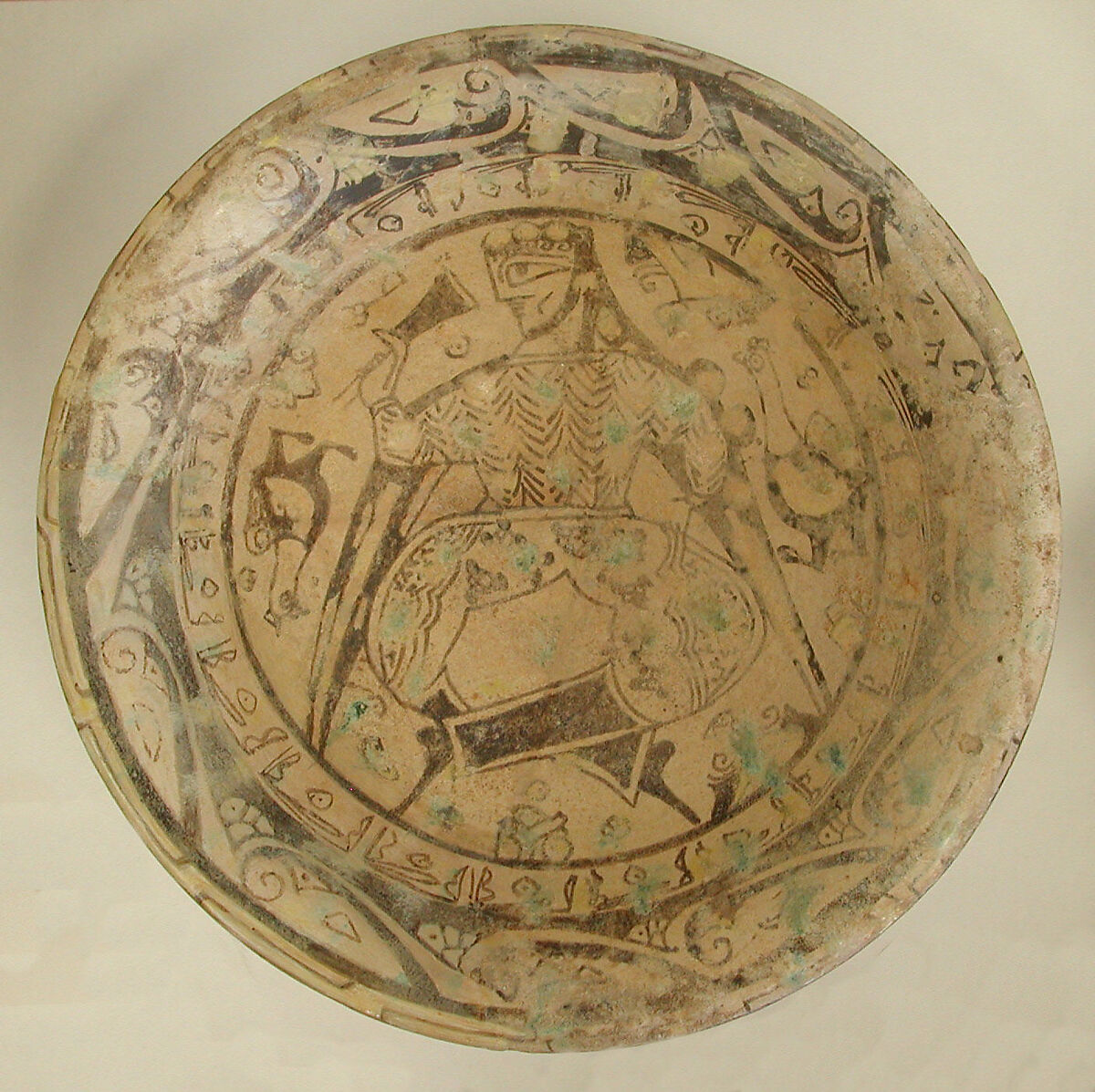 Bowl, Earthenware; underglaze painted in polychrome pigments under
 transparent glaze (buff ware) 