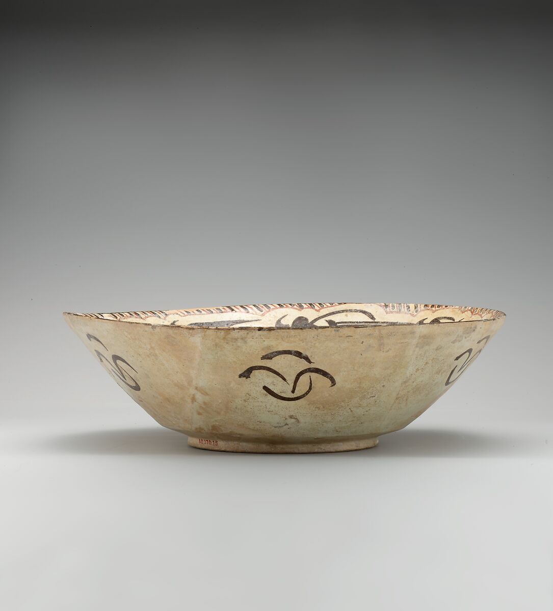 Bowl with Arabic Inscription, "Blessing, Prosperity, Well-being, Happiness", Earthenware; white slip with polychrome slip decoration under transparent glaze