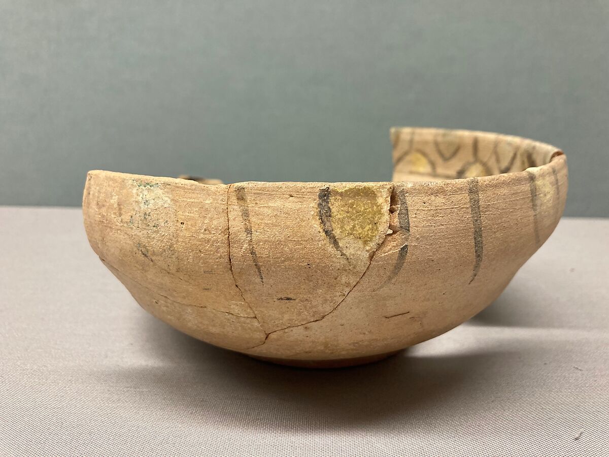 Bowl, Earthenware; decoration in black with touches of yellow and green