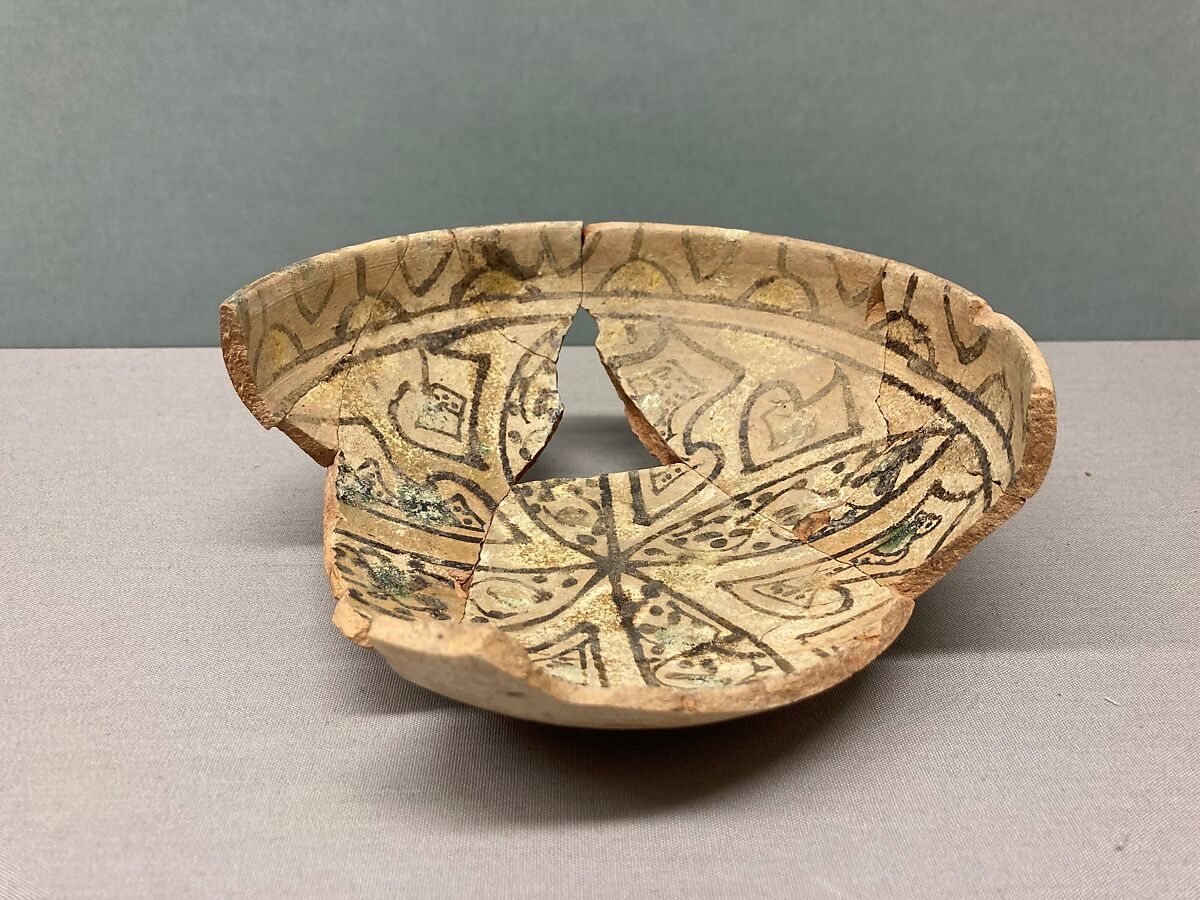 Bowl, Earthenware; decoration in black with touches of yellow and green