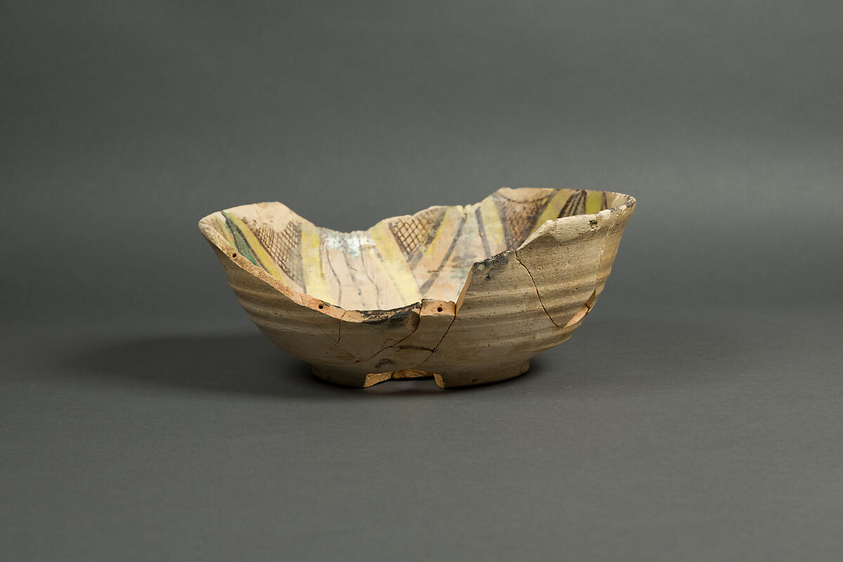 Bowl, Earthenware; buff slip, with polychrome slip decoration under transparent glaze 