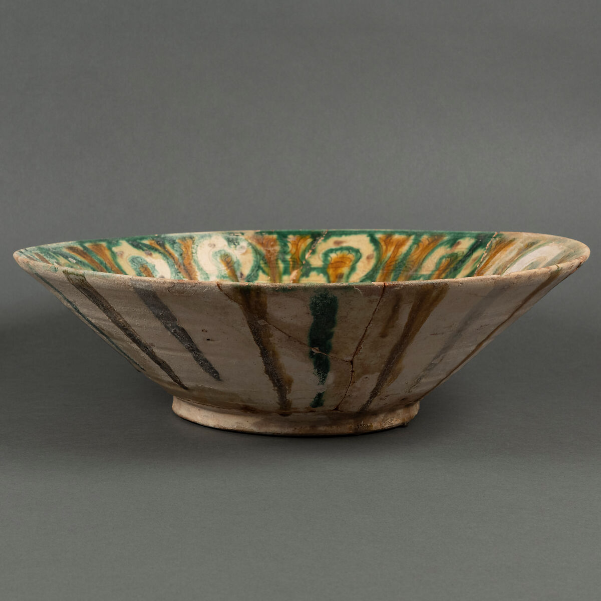 Bowl, Earthenware; white slip, incised and splashed with polychrome glazes under transparent glaze (sgraffito ware)