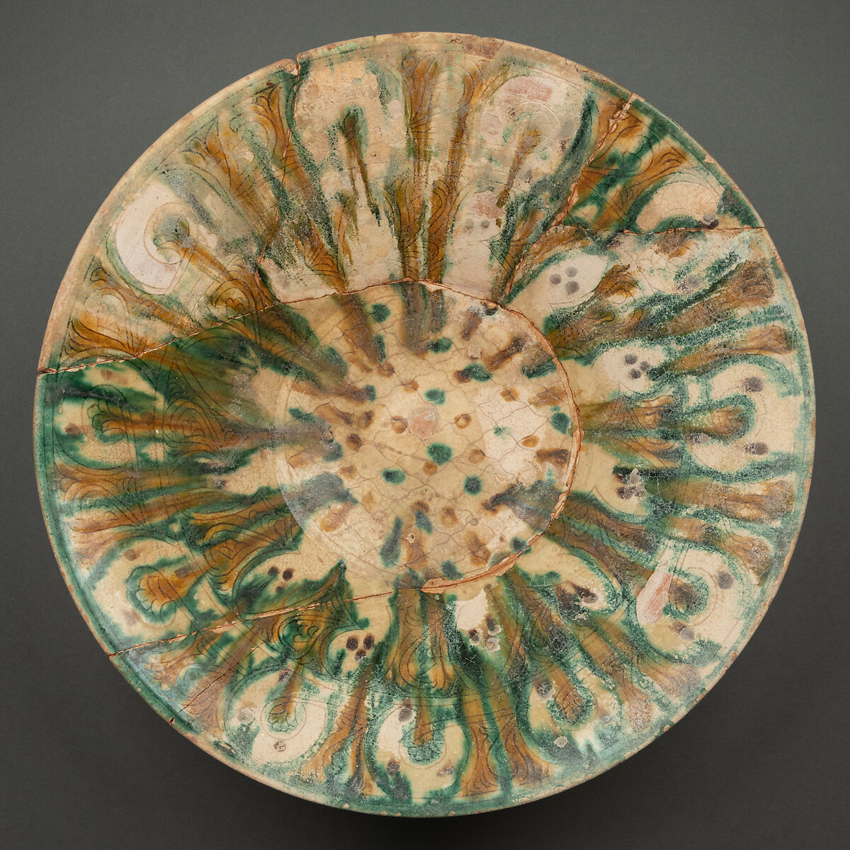 Bowl, Earthenware; white slip, incised and splashed with polychrome glazes under transparent glaze (sgraffito ware) 