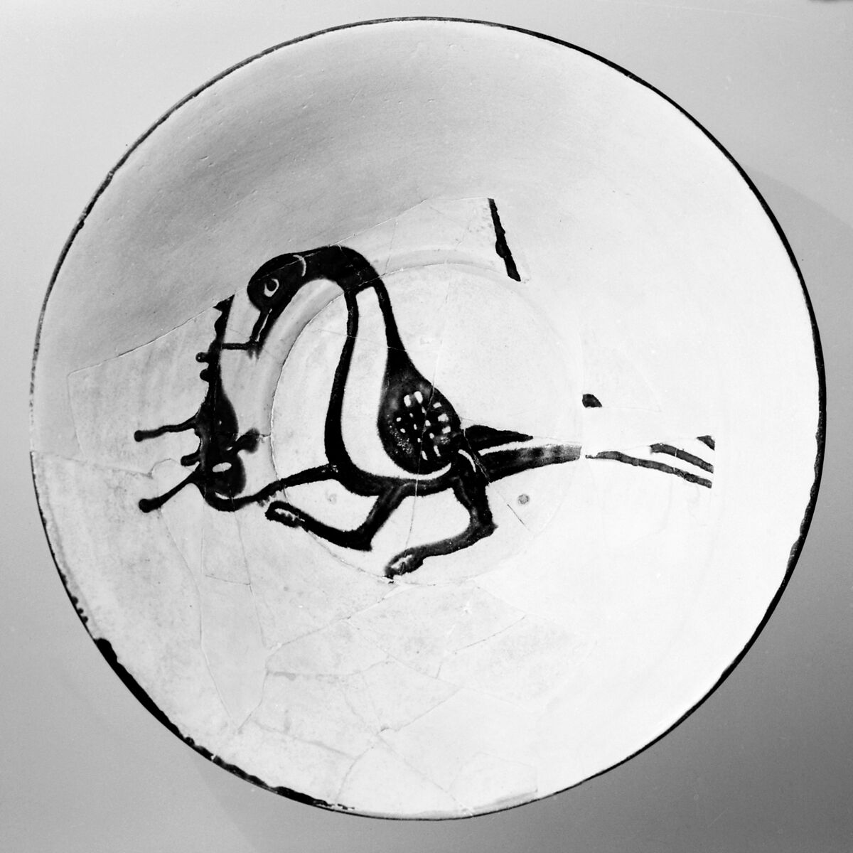 Bowl, Earthenware; white slip with monochrome slip decoration under transparent glaze