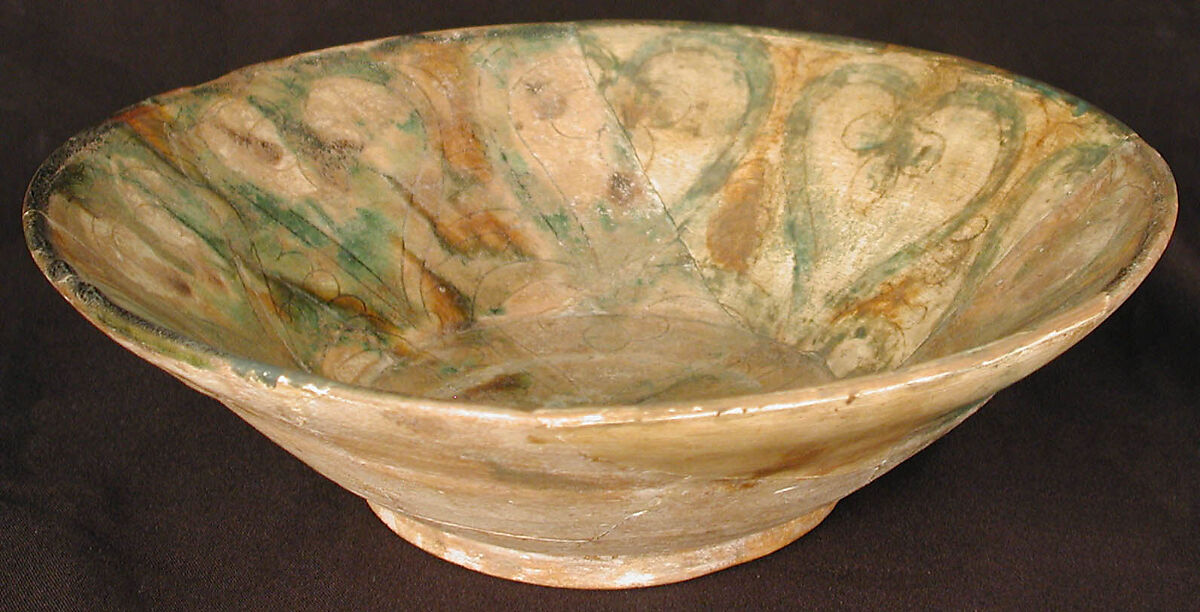 Bowl, Earthenware; white slip, incised and splashed with polychrome glazes under transparent glaze (sgraffito ware) 