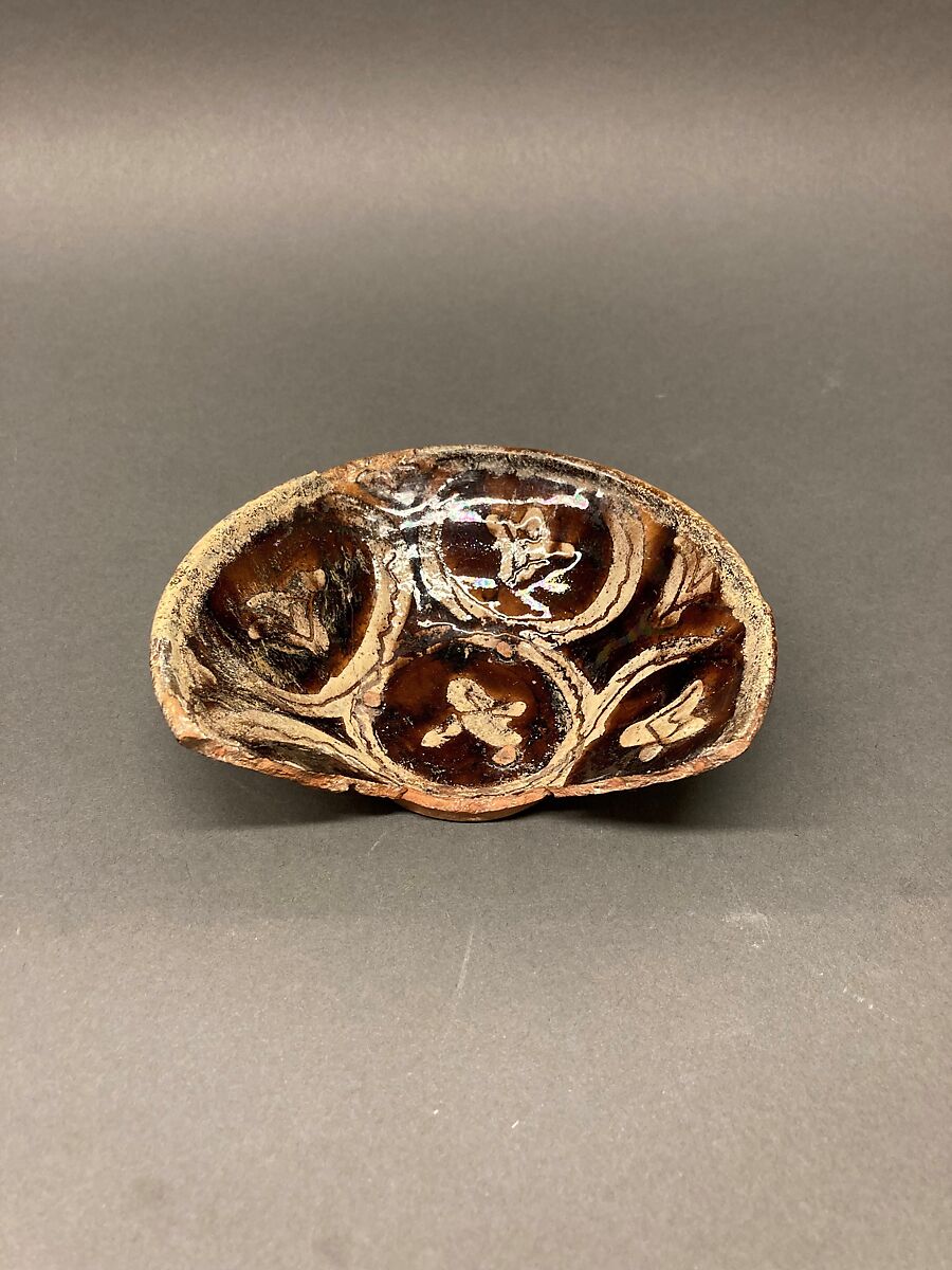 Bowl, Earthenware; black slip, decoration in white, yellowish glaze