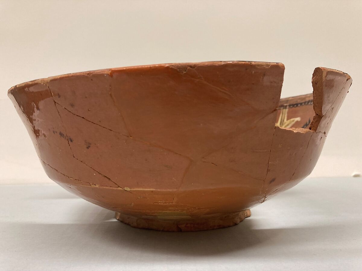 Bowl, Earthenware; reddish brown slip, polychrome slip decoration under glaze 