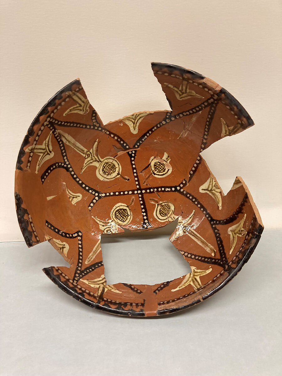 Bowl, Earthenware; reddish brown slip, polychrome slip decoration under glaze