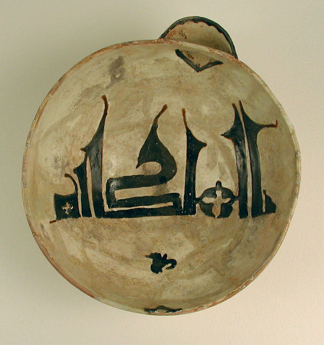 Spouted Bowl, Inscribed "Sovereignty is God's", Earthenware; white slip with black slip decoration under transparent glaze