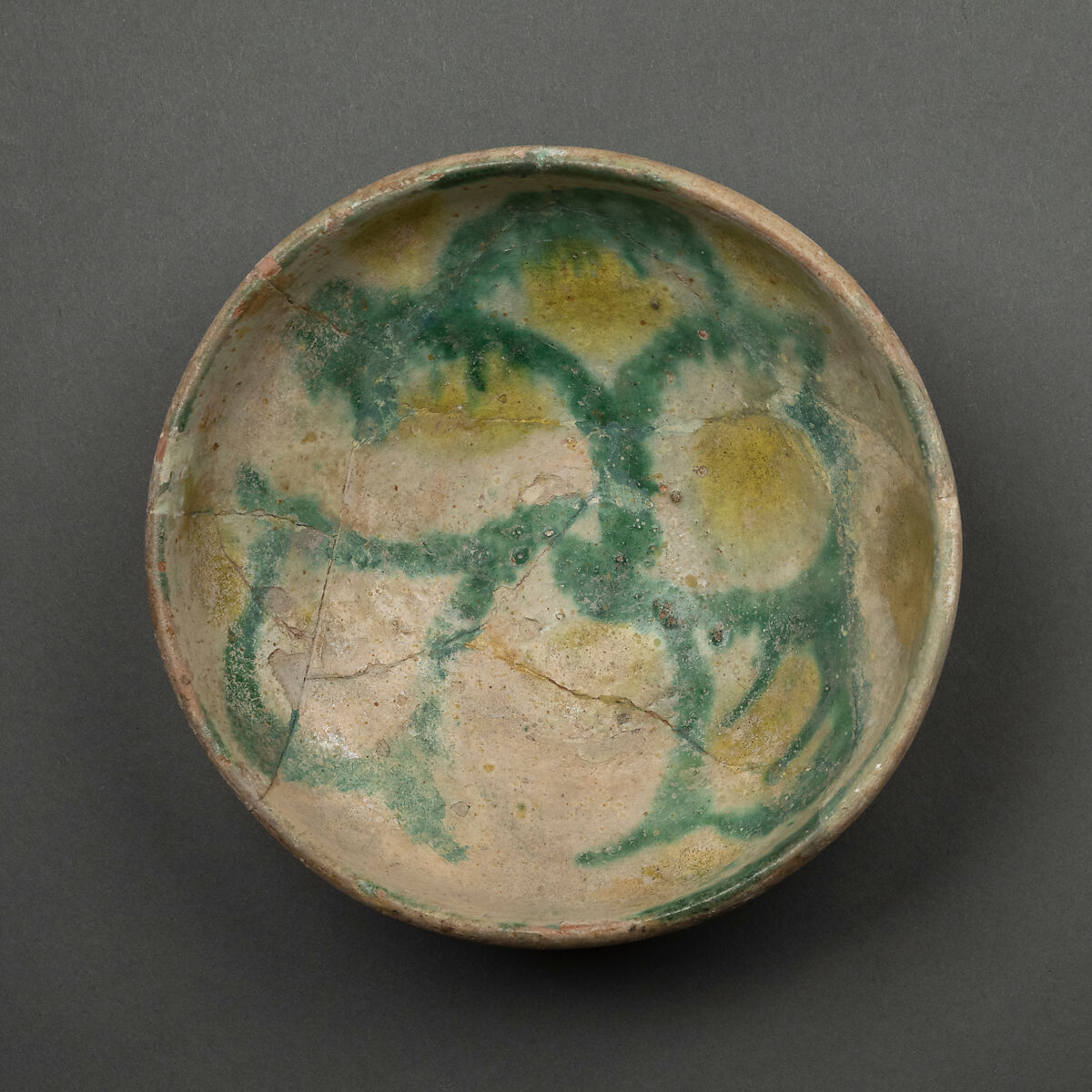 Bowl, Earthenware; white slip with polychrome slip decoration under transparent glaze