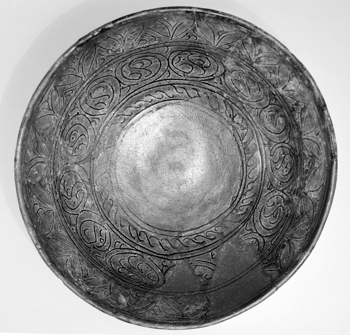 Bowl, Earthenware; white slip, incised and splashed with polychrome glazes under transparent glaze (sgraffito ware)