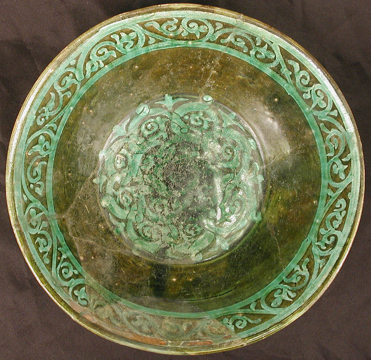 Bowl, Earthenware; purplish red slip, white slip decoration under green glaze
